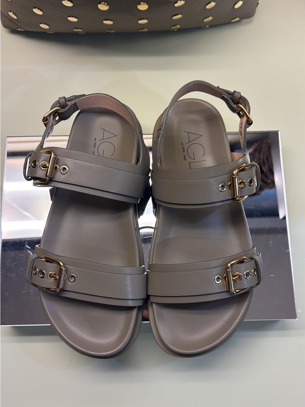 AGL Taupe Leather Double-Buckle Sandals with Gold Hardware